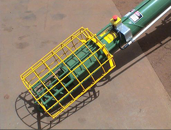 Grain auger with guard and warning stickers